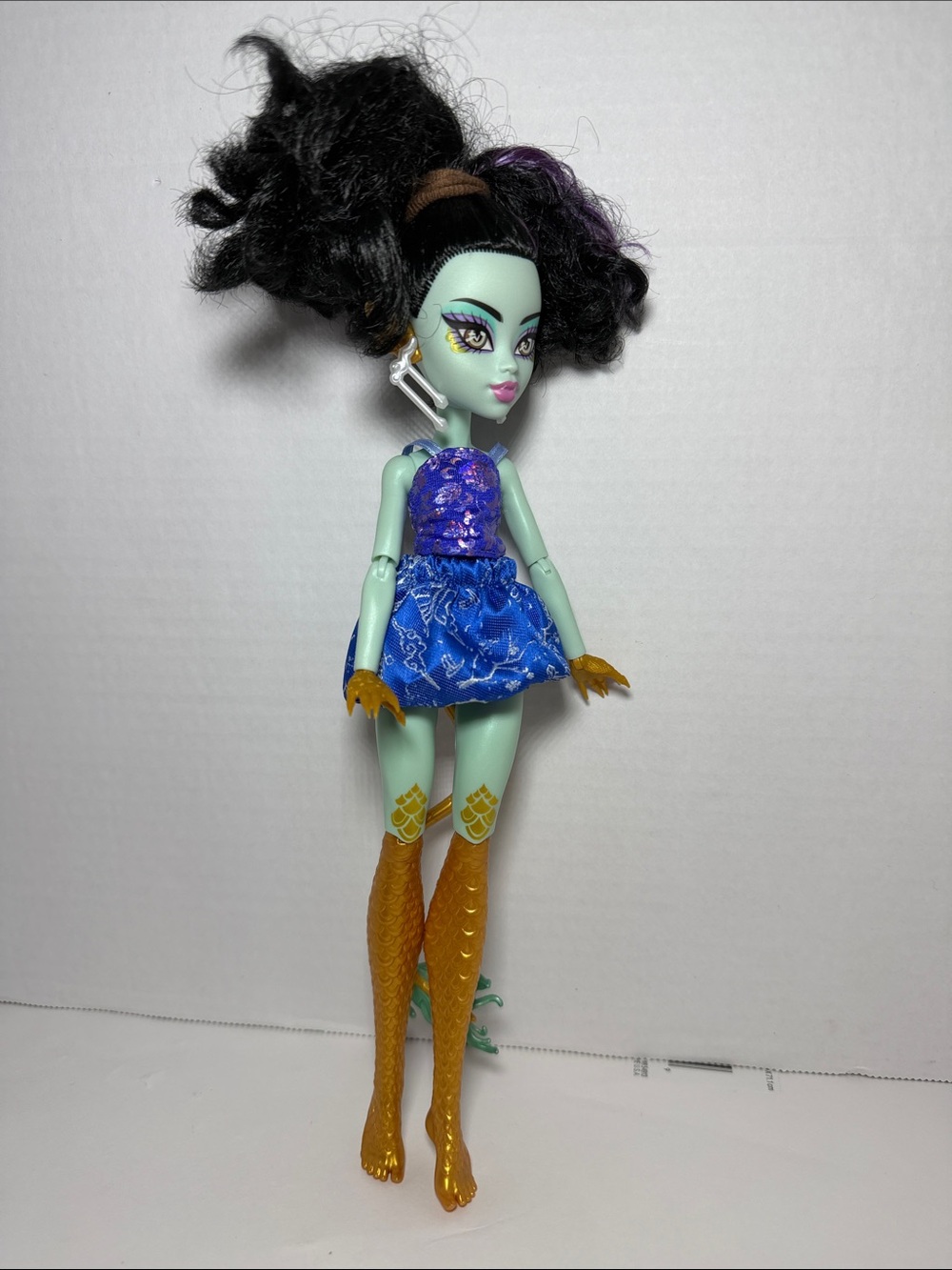 Mattel Mint Green Doll with Purple Fabric Outfit and Gold Tail